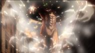 Eren's iconic walk with the boulder on his shoulder (Image Source: Studio Wit)